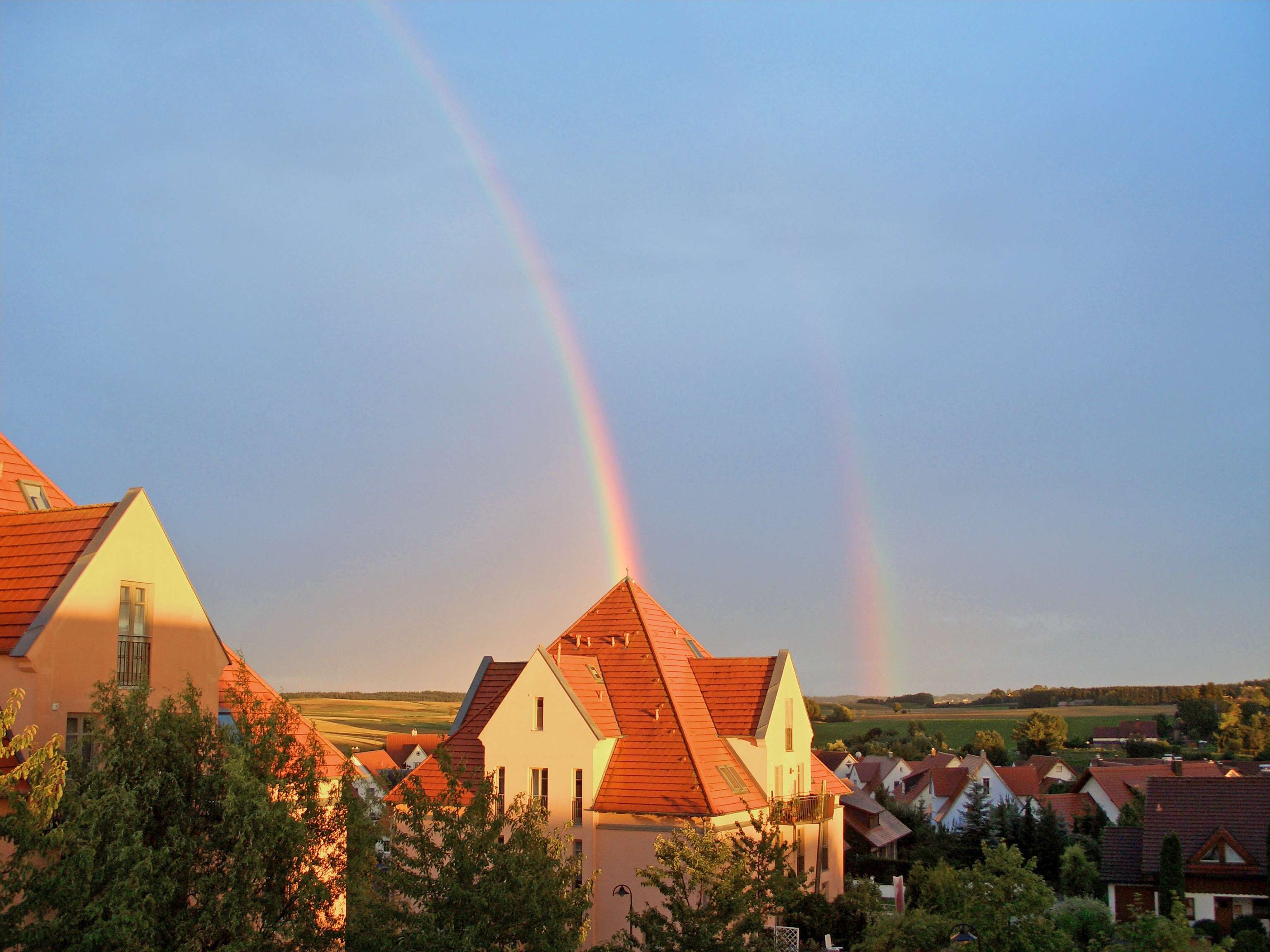 Haus mit Regenbogen